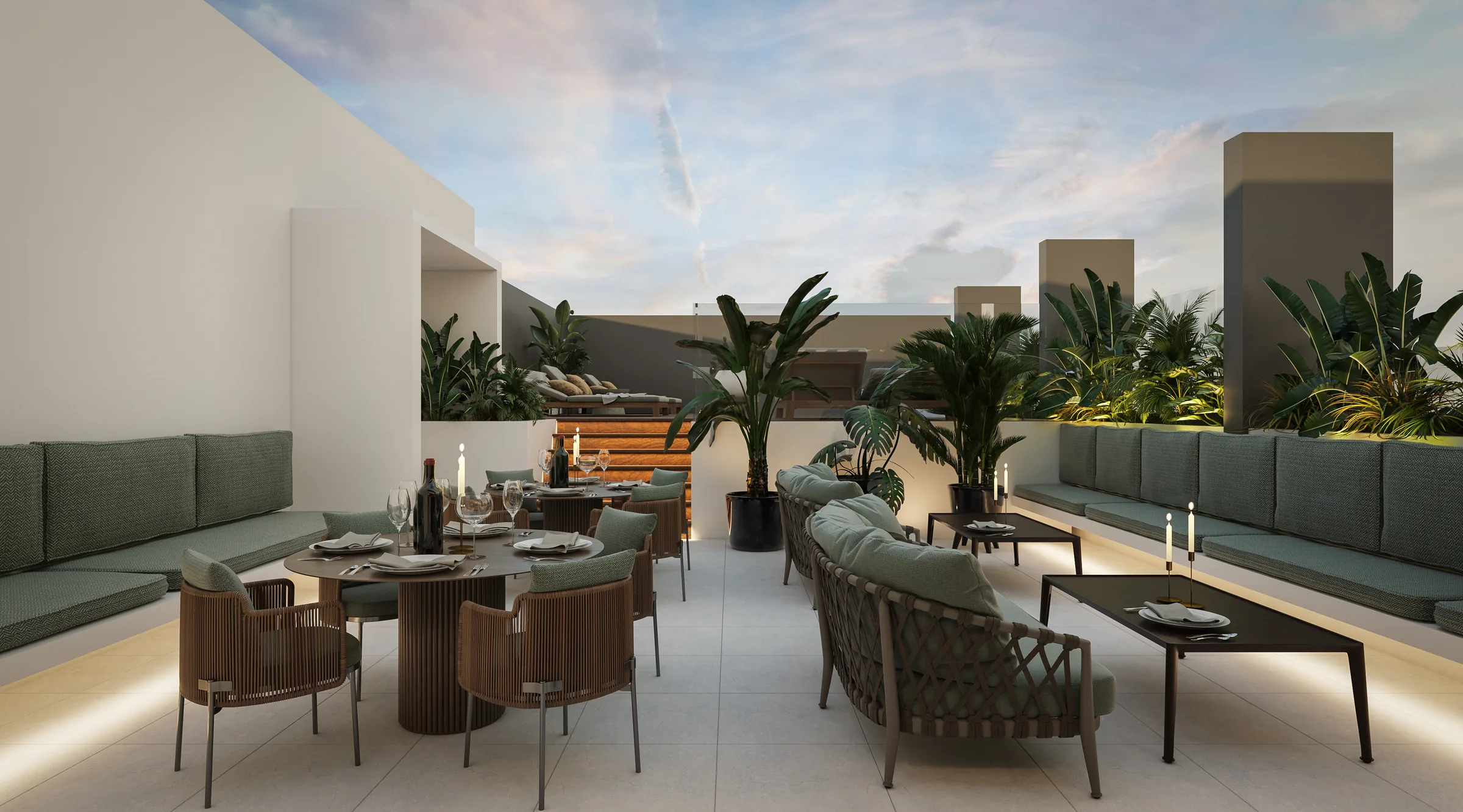 Lounge del rooftop con mesas, sofás y asadores